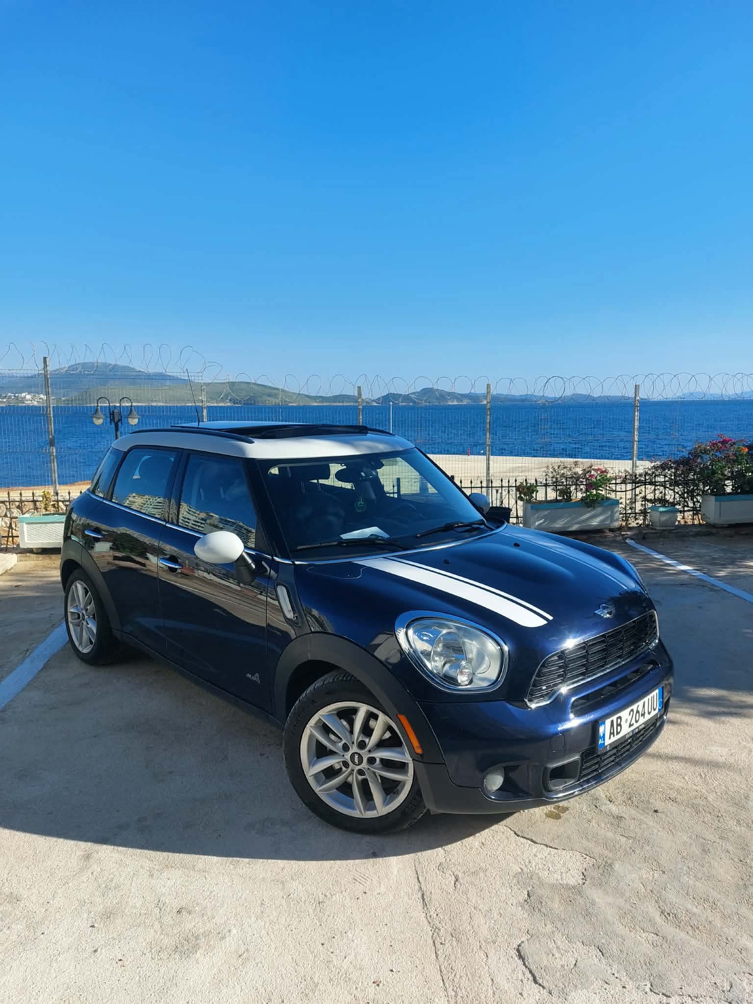 A Sarandacars rental car overlooking the Ionian sea